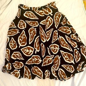 Who What Where brown black leaf patterned fit and flare flared wrap skirt.